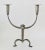 Rare monkey candelabra executed in brushed nickel over brass. Made in the 1920s.