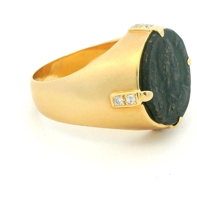 Vintage Italian 18 karat yellow gold intaglio ring by Bastian Bros, designed in a refined Roman revival style with strong...