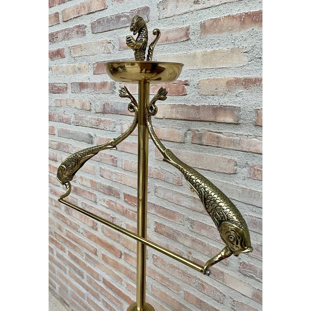 Bronze and brass valet stand dressboy, 1940s a gentleman's valet with many interesting details. the valet is in a very...