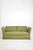 Three seats sofa in the style of Madeleine Castaing, 1970s. Large three-seater sofa with an inclined, upholstered side...