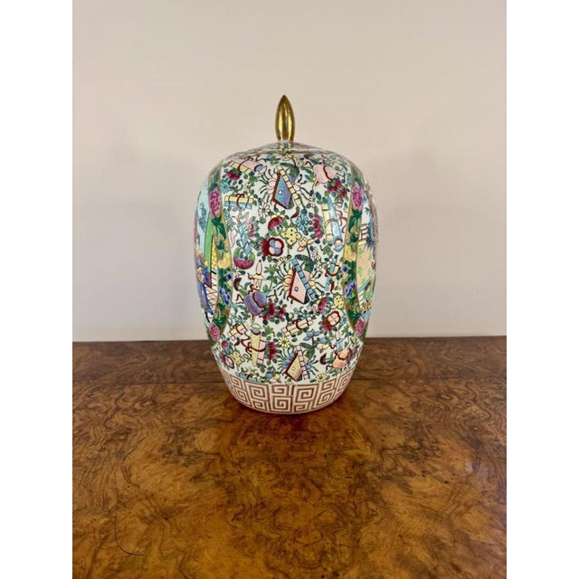 Quality early 20th Century Chinese famille rose vase and cover, having a quality antique Chinese famille rose vase and...