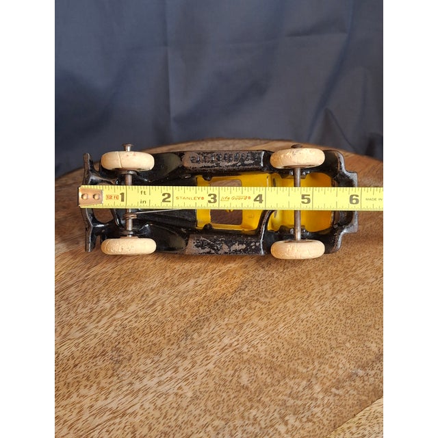 A significant find for the advanced cast iron automotive collector. This is the Rare 6-Inch "Deluxe" Scale Hubley Take-A-...