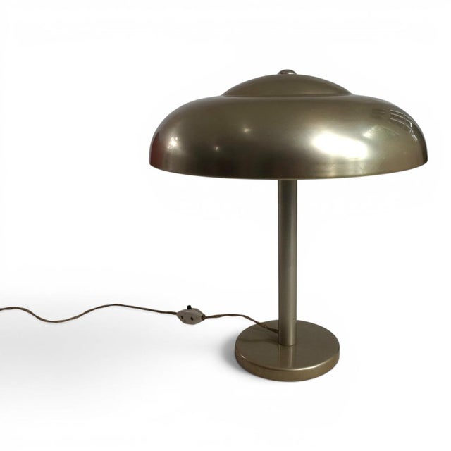 This original wmf ikora table lamp from the 1930s is an exceptional example of german modernism, combining the clean lines...