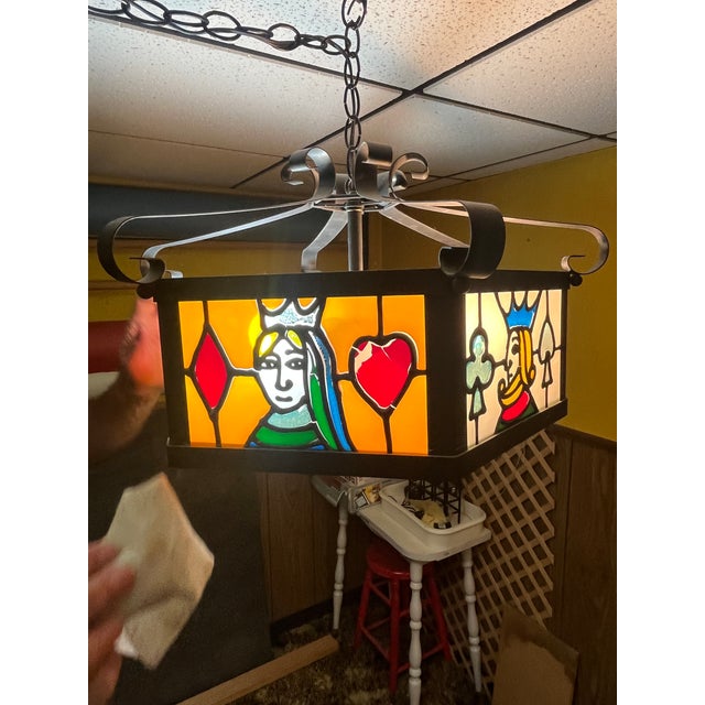 Bring nostalgic retro tavern charm to your game room or home bar with this striking vintage 1970s stained glass pendant...