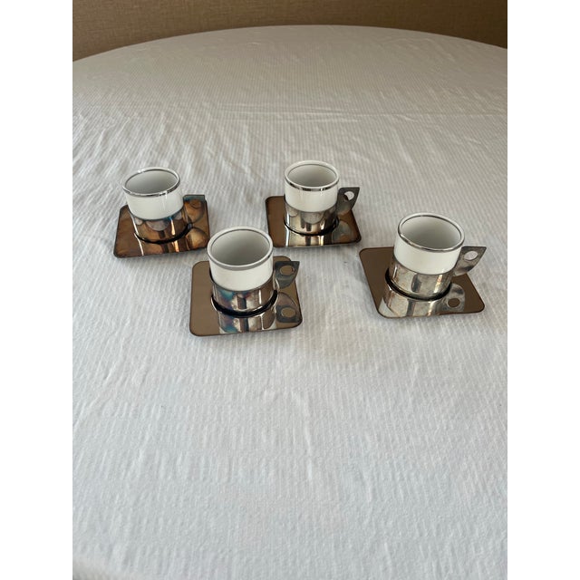 Mid-century modern silver plated silver espresso serving set by Wolff. Each cup includes a saucer and holds 2 fluid ounces.