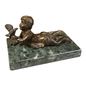 Bronze Statue Boy Holding Bird