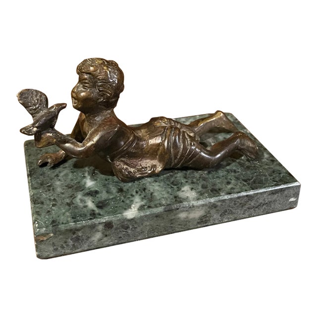 Early 20th Century Bronze Statue Boy Holding Bird For Sale