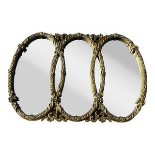 Mid Century Hollywood Regency Ornate Gold Triple Oval Wall Mirror For Sale