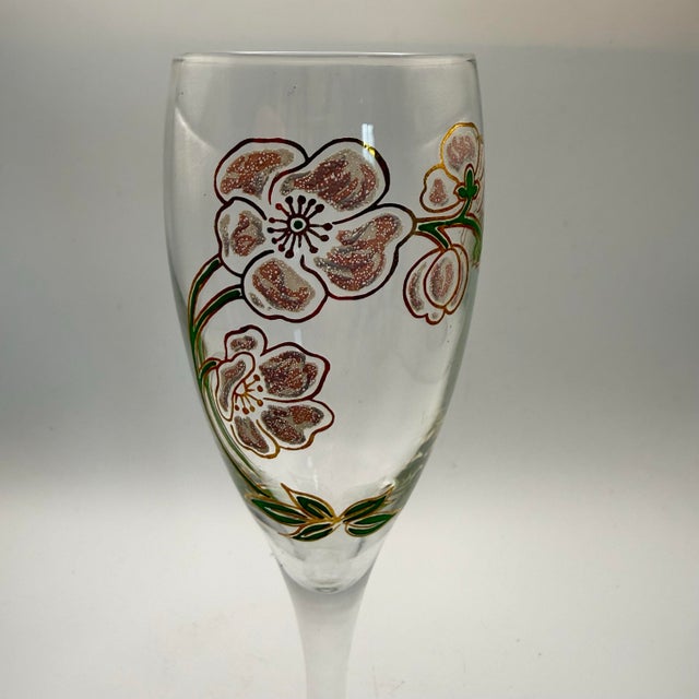 Vintage Perrier-Jouët Belle Époque champagne flutes, hand-painted with the iconic Art Nouveau anemone design created by...