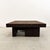 A striking MCM 1970s cork coffee table featuring a clean square silhouette and a newly applied chocolate cork veneer. This...