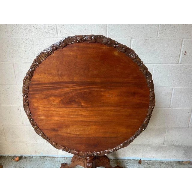 Antique Chippendale Style Mahogany Tilt-Top Table. Circa 1920-1930s. Carved with Ball & Claw Feet, Solid wood, Well made,...