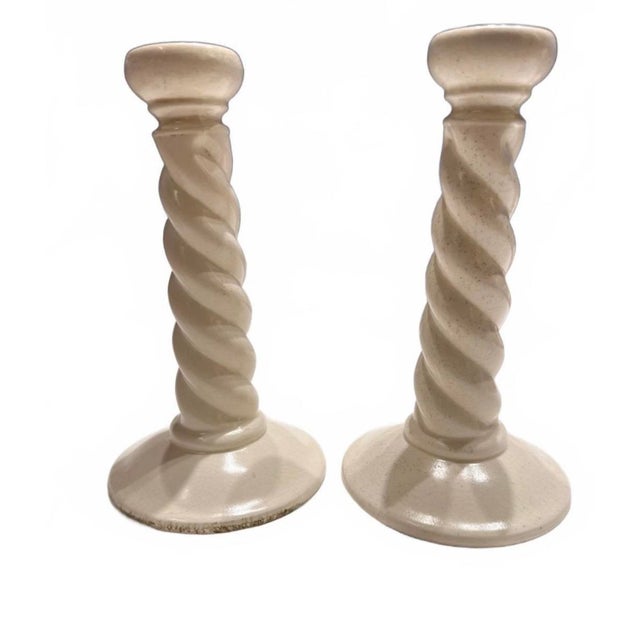 For your consideration is a unique vintage pair of ceramic spiral-twist candlesticks designed by Maynard Anthony Freeman...