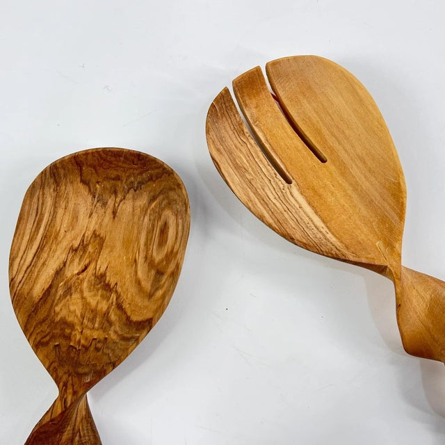A set of wood hand-carved spoons. Made throughout eastern Africa where renewable and sustainable deciduous tree resources...