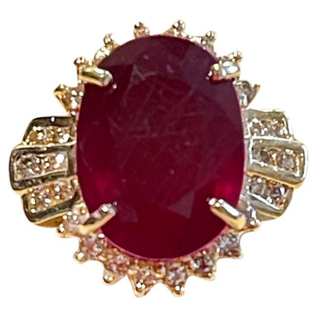 Oval 12 Carat Treated Ruby and 1 Carat Diamond 14 Karat Yellow Gold Ring For Sale - Image 15 of 18