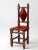 This is a mid 20th century Mexican hacienda children's chair. The gothic wooden chair features red velvet upholstered...