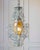 This wrought-iron lantern dating from the early 1900s is a fascinating piece of furniture that combines style and history....