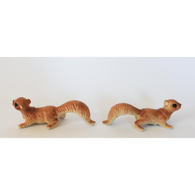 Pair of vintage ceramic squirrel wall climbers made in Japan. Makes mark on the bottom of one. Minor age wear. No chips or...