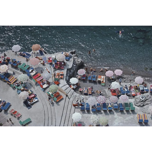 Slim Aarons, Positano Beach, Estate Stamped Photographic Print, 1979 / 2020s For Sale