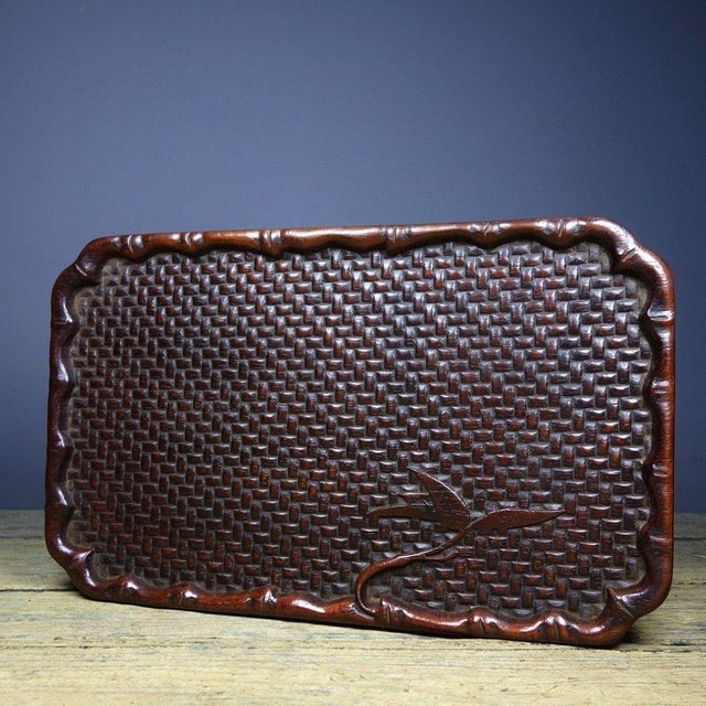 This is a finely carved vintage Chinese wooden tea tray, crafted from rosewood (Huali wood). The rectangular tray features...