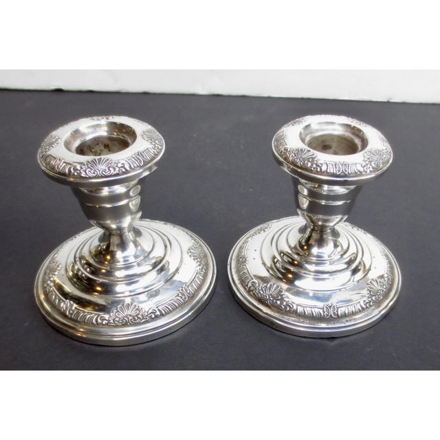 Beaux Arts sterling silver candlesticks. Weighted and heavy. The measurements are 3.75" in diameter and 3.5" tall.