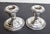 Beaux Arts sterling silver candlesticks. Weighted and heavy. The measurements are 3.75" in diameter and 3.5" tall.