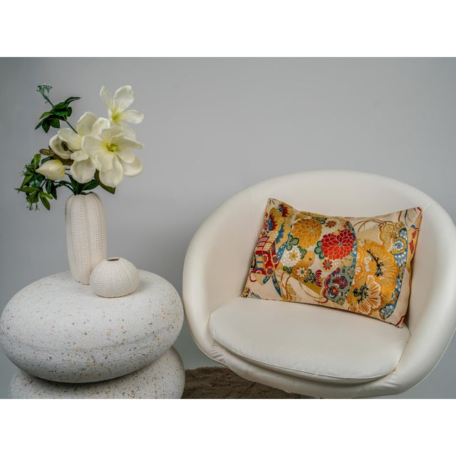 Invite the auspicious winds of fortune into your home with The Gilded Ogi Harmony by Renaras. This bespoke cushion is a...