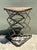 This vintage industrial side table pairs a richly patinated stone top with a sculptural metal scissor-lift base, capturing...