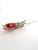 Sculptural Danish Modern table lamp executed in brass with a distinctive tiered red lacquered metal shade, Denmark, circa...