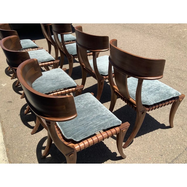 Solid walnut chairs. Modern Klismos dining chairs with upholstered seats cushions. The Robsjohn Gibbings style Klismos...