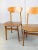 Vintage wooden dining chairs in original leatherette upholstering. Seat height 44cm. Good overall vintage condition....
