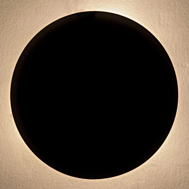 The simplest of sconces, the Shadow is handcrafted of minimally finished black metal. When lit the striking effect is...