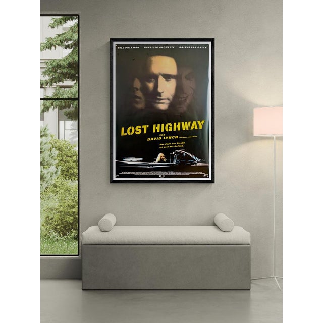 The Piece This original German movie poster promotes David Lynch's 1997 psychological thriller, "Lost Highway". The...