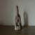 A sculptural hand carved soapstone love knot featuring intertwined looping forms and a softly polished finish. Natural...