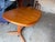 The 1960s 7 ft Danish Teak Oval Dining Table with a 20" Hide Away Center Leaf is a beautifully crafted piece of mid-...