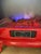 Vintage 2000s red petite metal electric fireplace with heater component and faux flames. Looks real and so cozy for...
