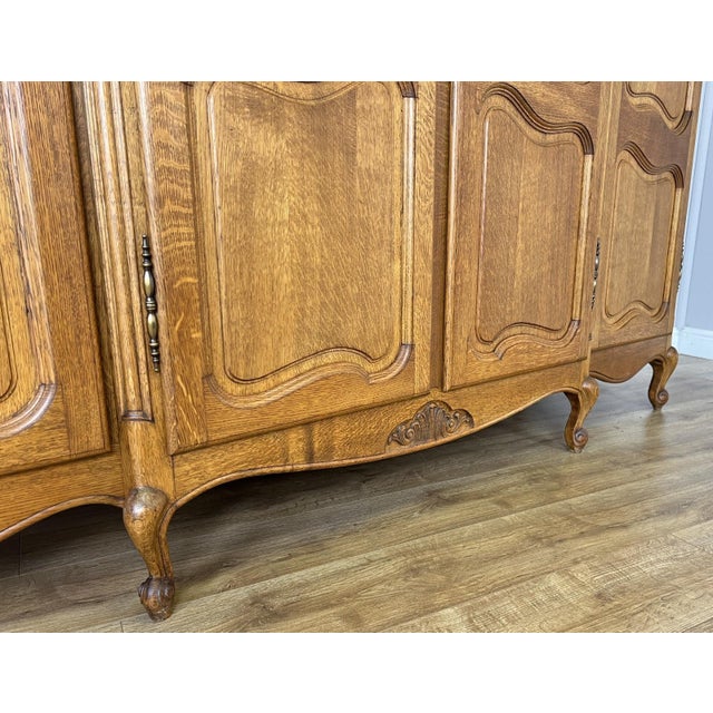 Wood Vintage Louis XVI French Oak Four Door Carved Armoire For Sale - Image 7 of 11