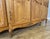 Wood Vintage Louis XVI French Oak Four Door Carved Armoire For Sale - Image 7 of 11