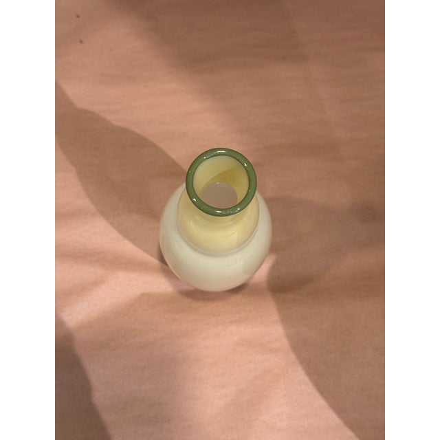This is a vintage Studio Paran vase. It was made by Richard Jones. It is hand blown glass art. The origin of the company...