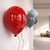 Add a unique sense of individuality into your space with this incredibly stylish Red Ceramic balloon wall sculpture....