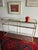 Elegant Williams Sonoma Home console table from the Terrace collection, featuring a slender brass-finish metal frame with...