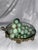 Decorative clusters resembling fruits, such as grapes, made from semi-precious stones have been popular as decorative...