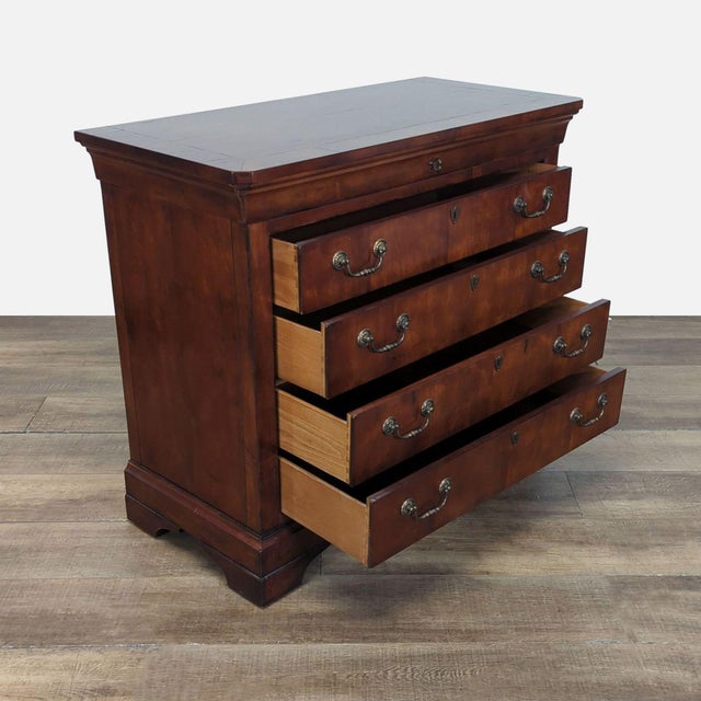 Features mahogany wood with brass drop pulls and keyholes,. Brand: Henredon. Model: Charles X. Dimensions (in): 44W x 21D...