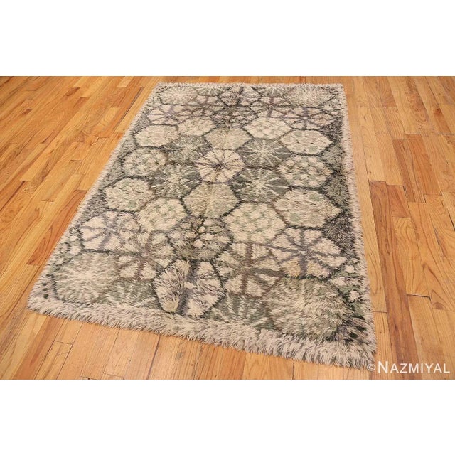 This exquisite vintage rya features a bold geometric design conceived by the highly decorated textile artist Marianne...
