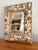 Diminutive vintage seashell mirror on wood board. Most items found at Pub & Oasis are vintage and antique in nature which...