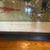 1 of 4 different blue market races that we have listed separately; original frame with wavy glass; vibrant colors.