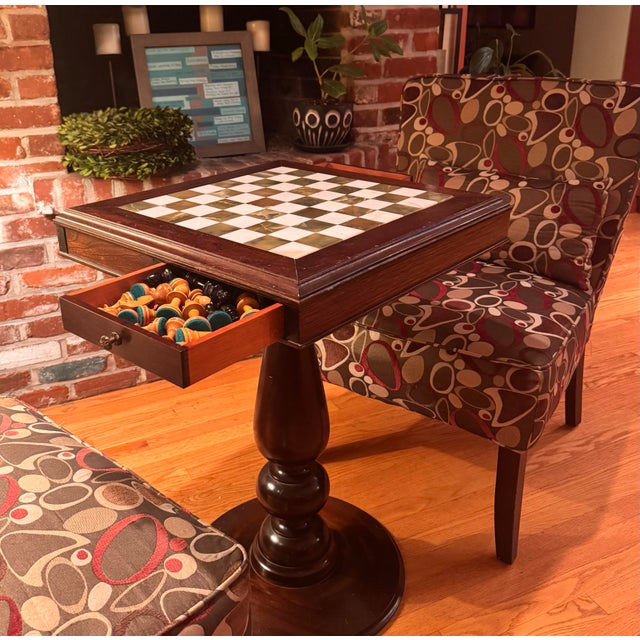 Beautiful vintage chess/game table brought back from Argentina, featuring a solid wood pedestal base and a striking green...