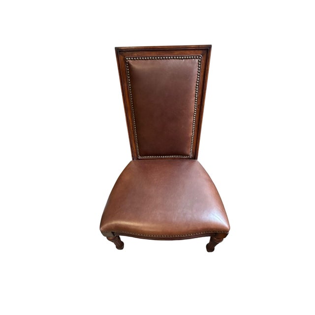 Classic craftsmanship and timeless elegance define this beautifully upholstered traditional dining side chair. Constructed...
