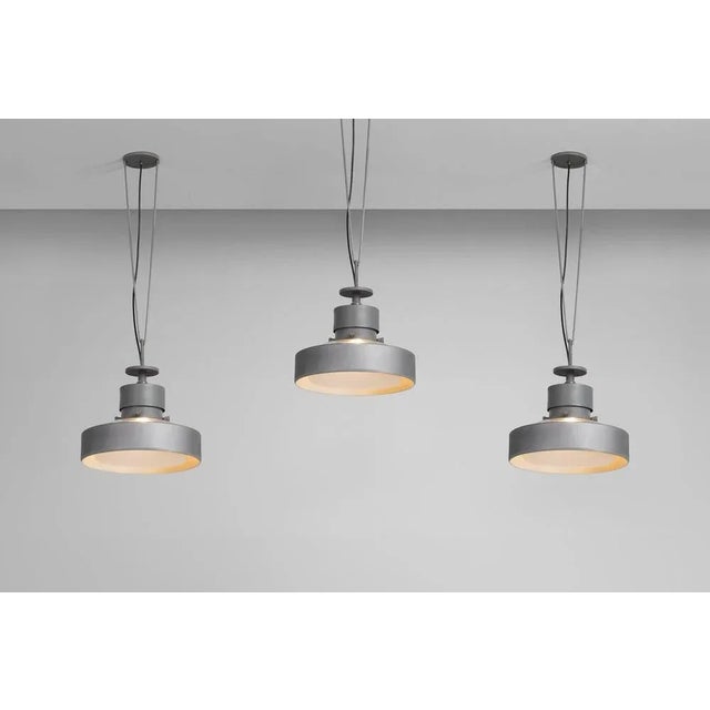 These rare pendant lamps were designed and manufactured by studio bbpr in 1956 specifically for the entrance hall of the...