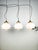 Wonderfull set of 3 Dutch opaline pendant lights, constructed out of GISO opaline glass with original brass fixtures....
