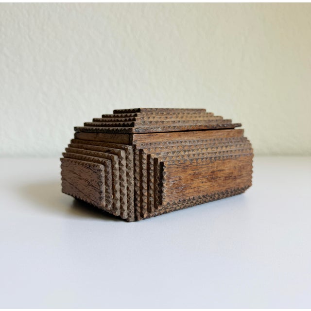 A wonderful example of early 1900s American tramp art. This handmade piece was crafted by from found cigar boxes and...